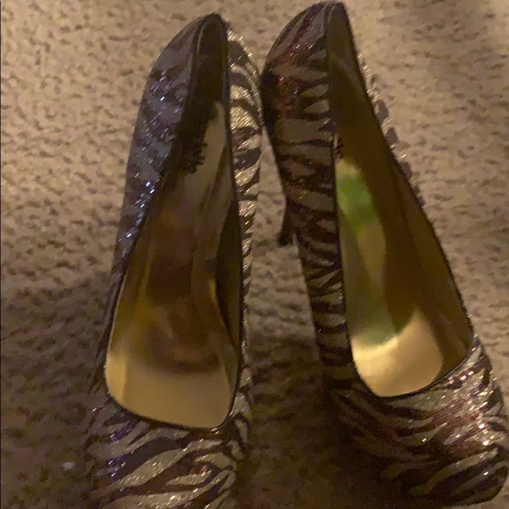 Brown and sliver gently used heels